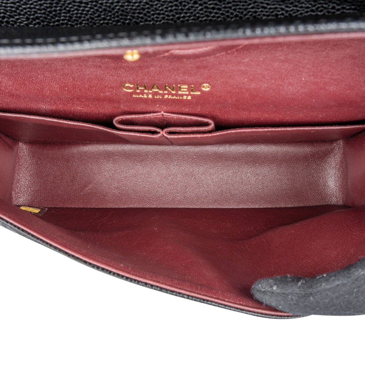 Borsa a tracolla Chanel Medium Double Flap in pelle caviale trapuntata con dettagli dorati