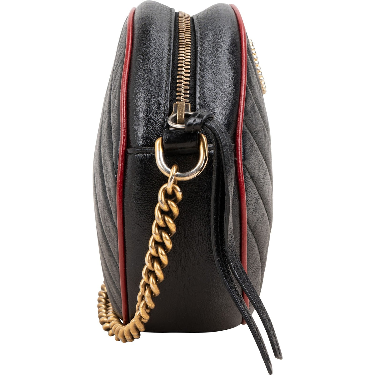 Bolso bandolera redondo GG Marmont de Gucci en piel acolchada bicolor