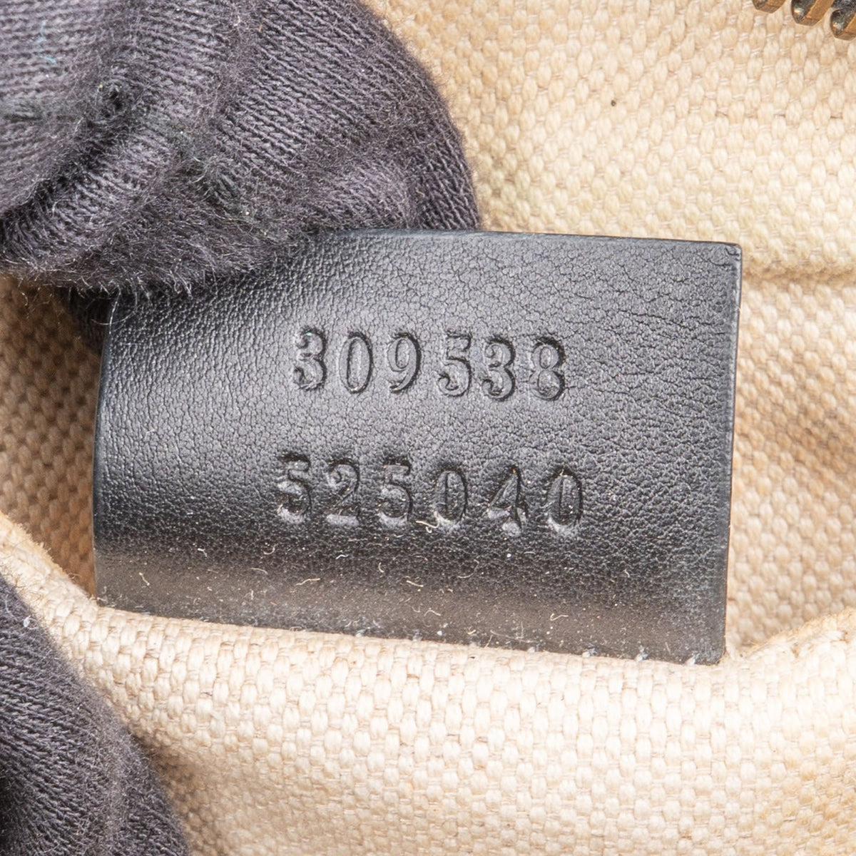 Bolso bandolera tipo cámara Gucci Guccissima de piel con borla de bambú