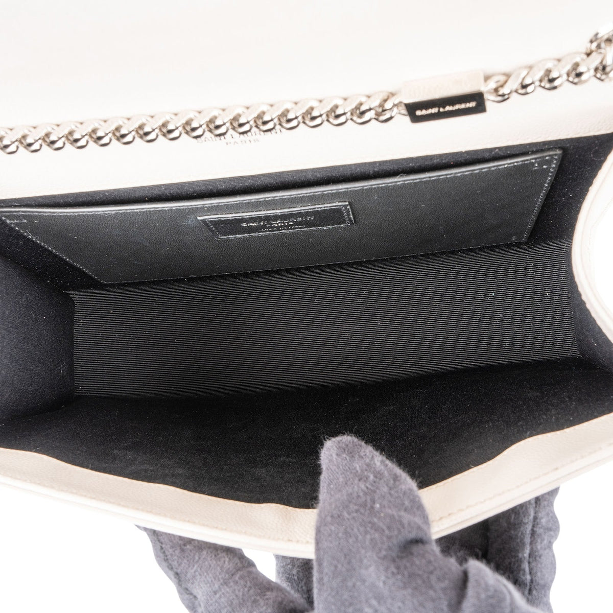 Bolso bandolera Kate de Saint Laurent en piel granulada con borla y cadena