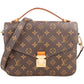 Louis Vuitton Monogram Canvas Métis aus Canvas und Vachetta-Leder – Vorderansicht