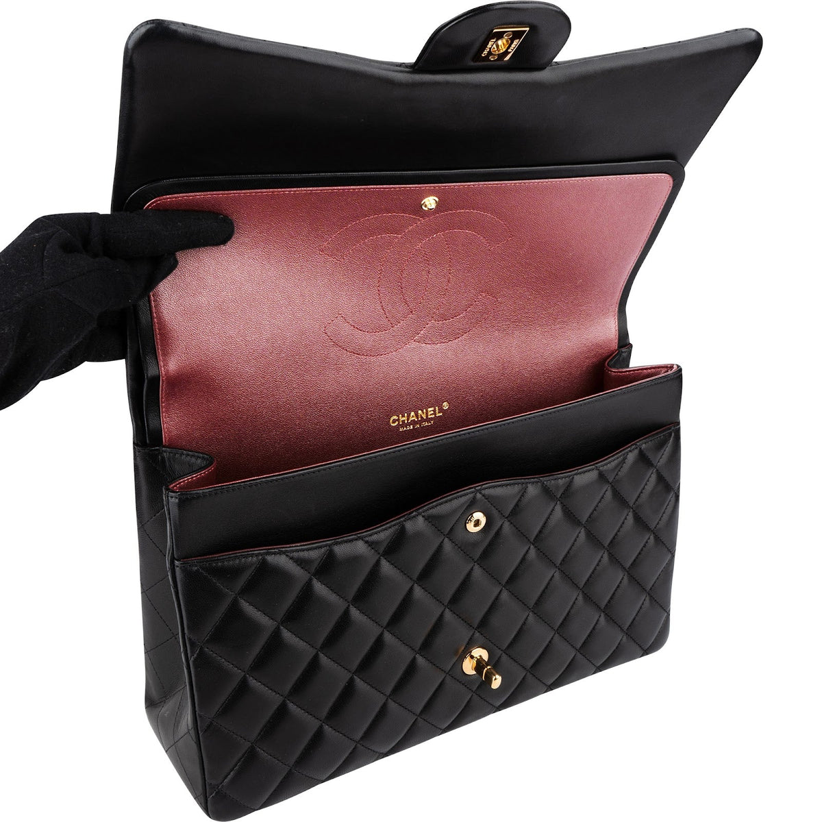 Borsa a tracolla Chanel Maxi Double Flap in pelle di agnello trapuntata con dettagli oro