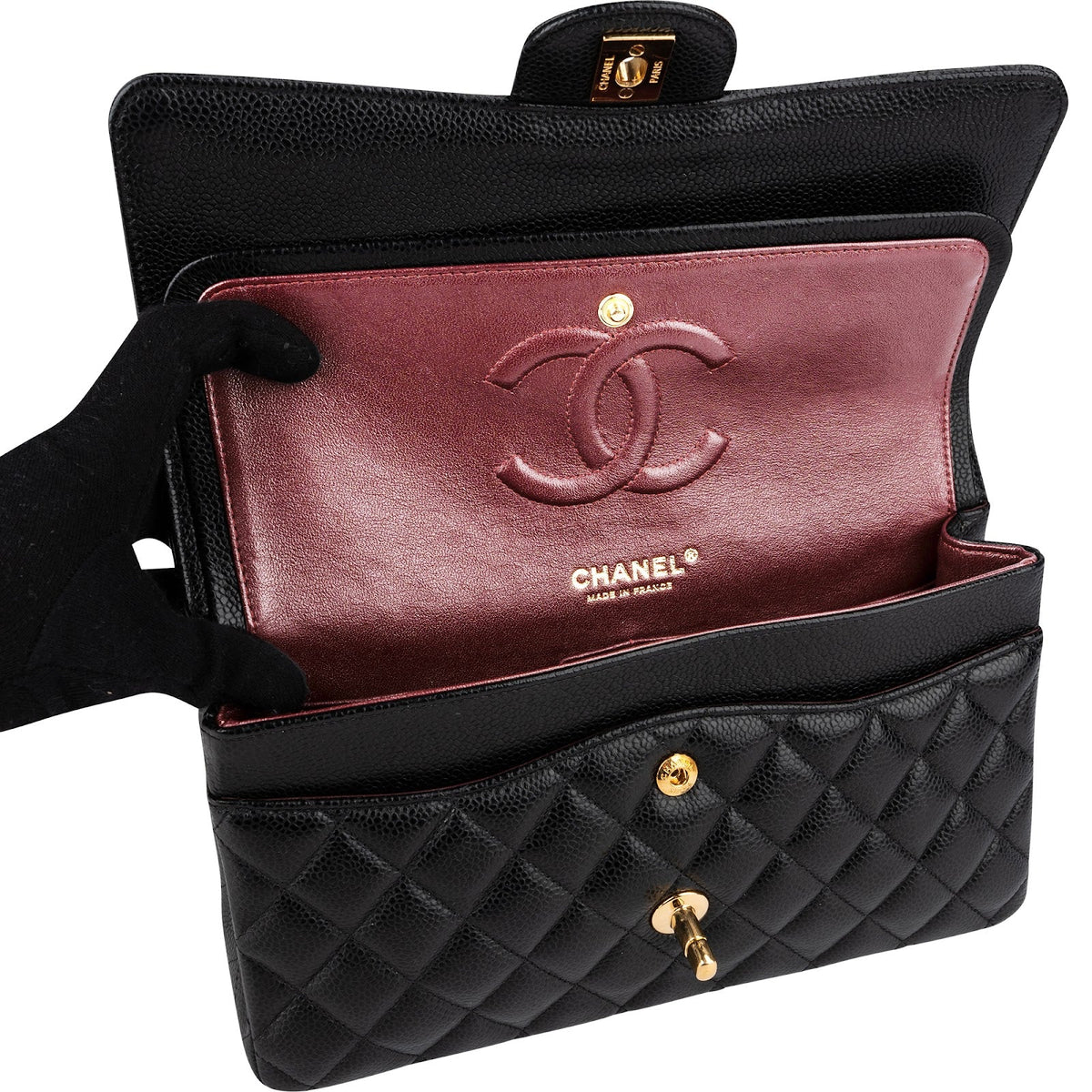 Borsa a tracolla Chanel Medium Double Flap in pelle caviale trapuntata con dettagli dorati