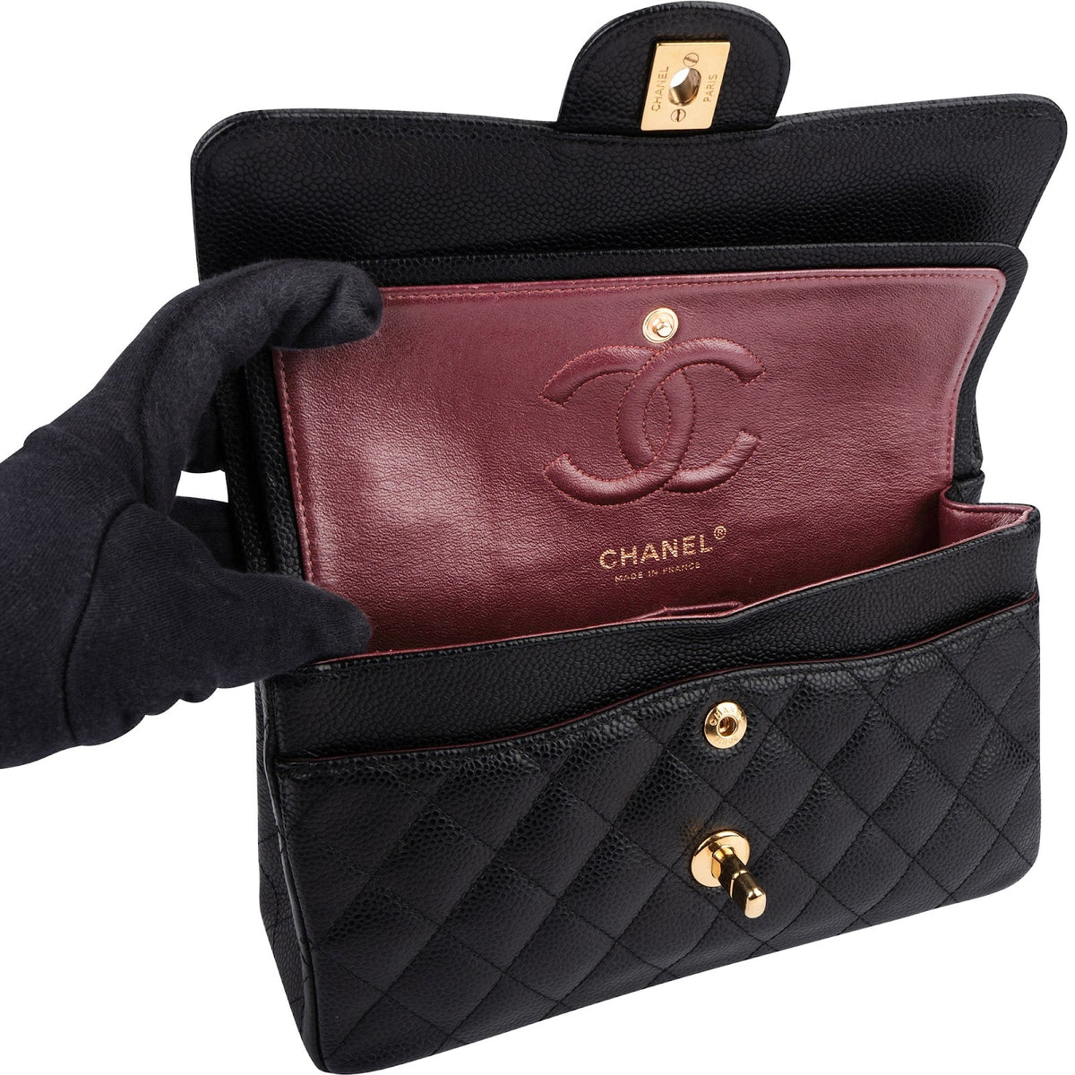 Sac à bandoulière Chanel Small Double Flap en cuir caviar matelassé doré