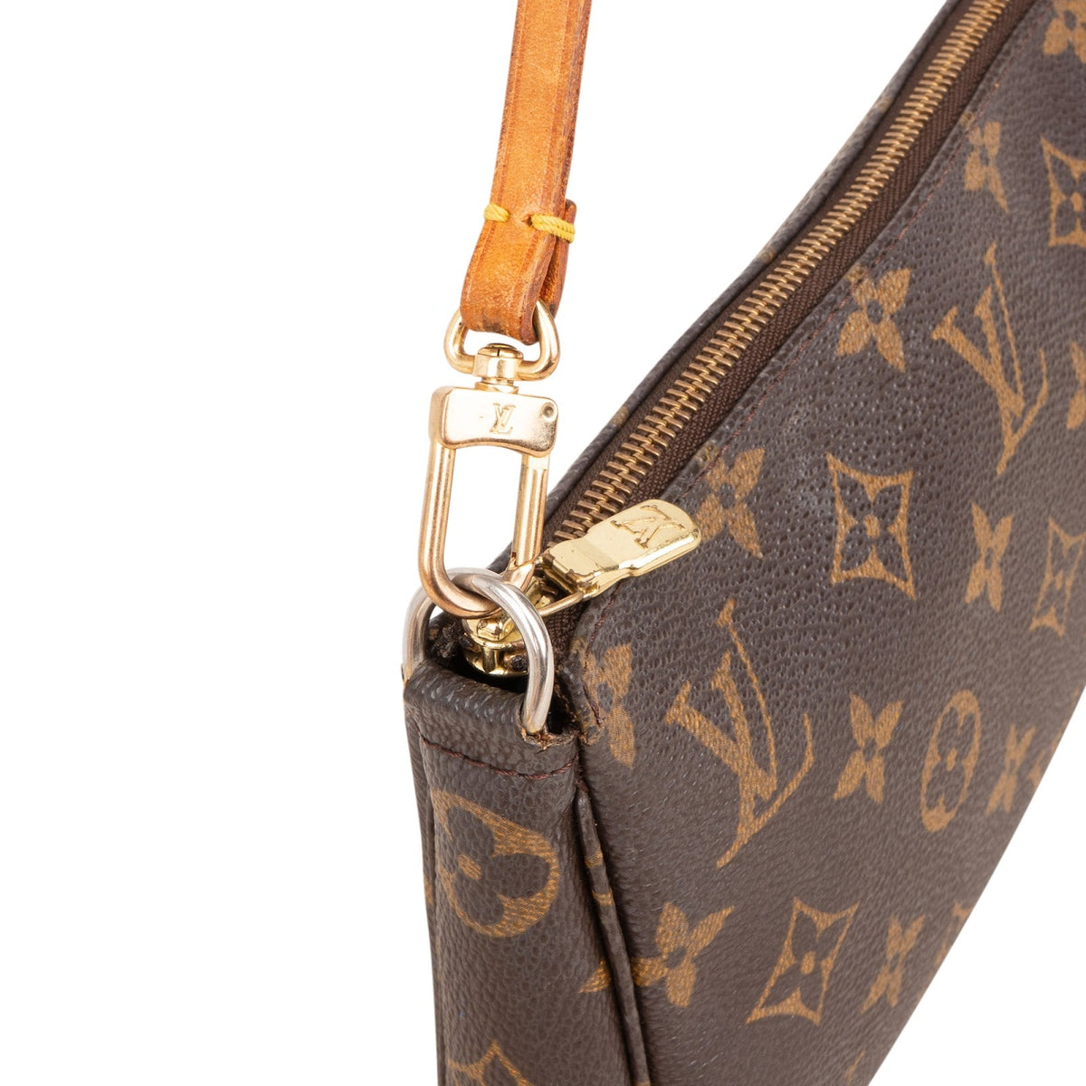 Pochette Accessoires en toile Monogram Louis Vuitton
