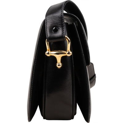 Bolso de hombro Triomphe con solapa de Celine en piel de becerro Boxcalf y carruaje