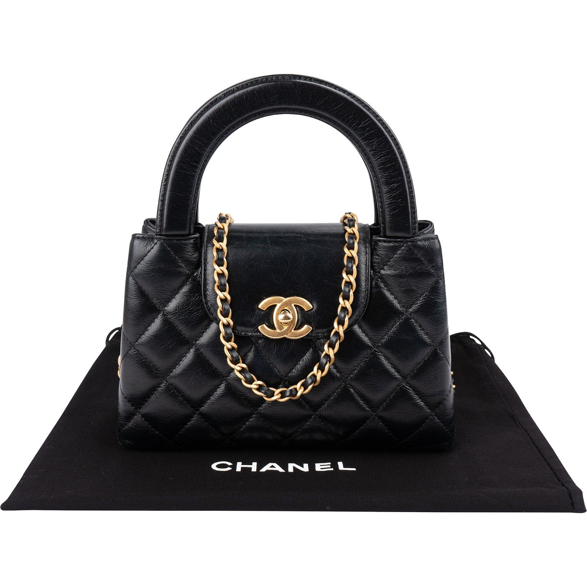 Sac bandoulière Chanel Nano Kelly à poignée en cuir d'agneau matelassé noir