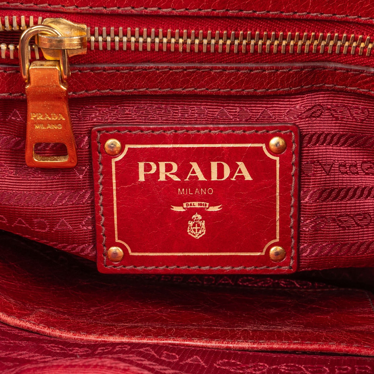 Borsa a mano Prada Bauletto in pelle Vitello Lux rossa