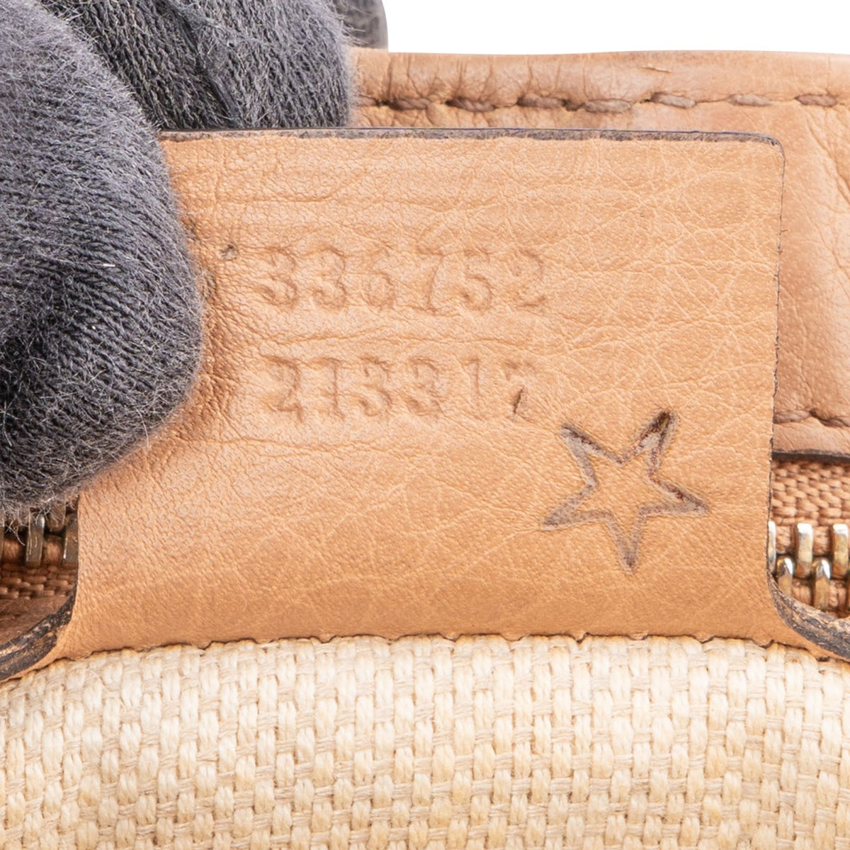 Sac bandoulière Gucci GG Soho en cuir grainé