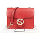 Gucci Pebbled Leather Interlocking GG Small Crossbody Bag