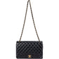 Bolso bandolera Chanel Jumbo de piel de cordero acolchada con doble solapa