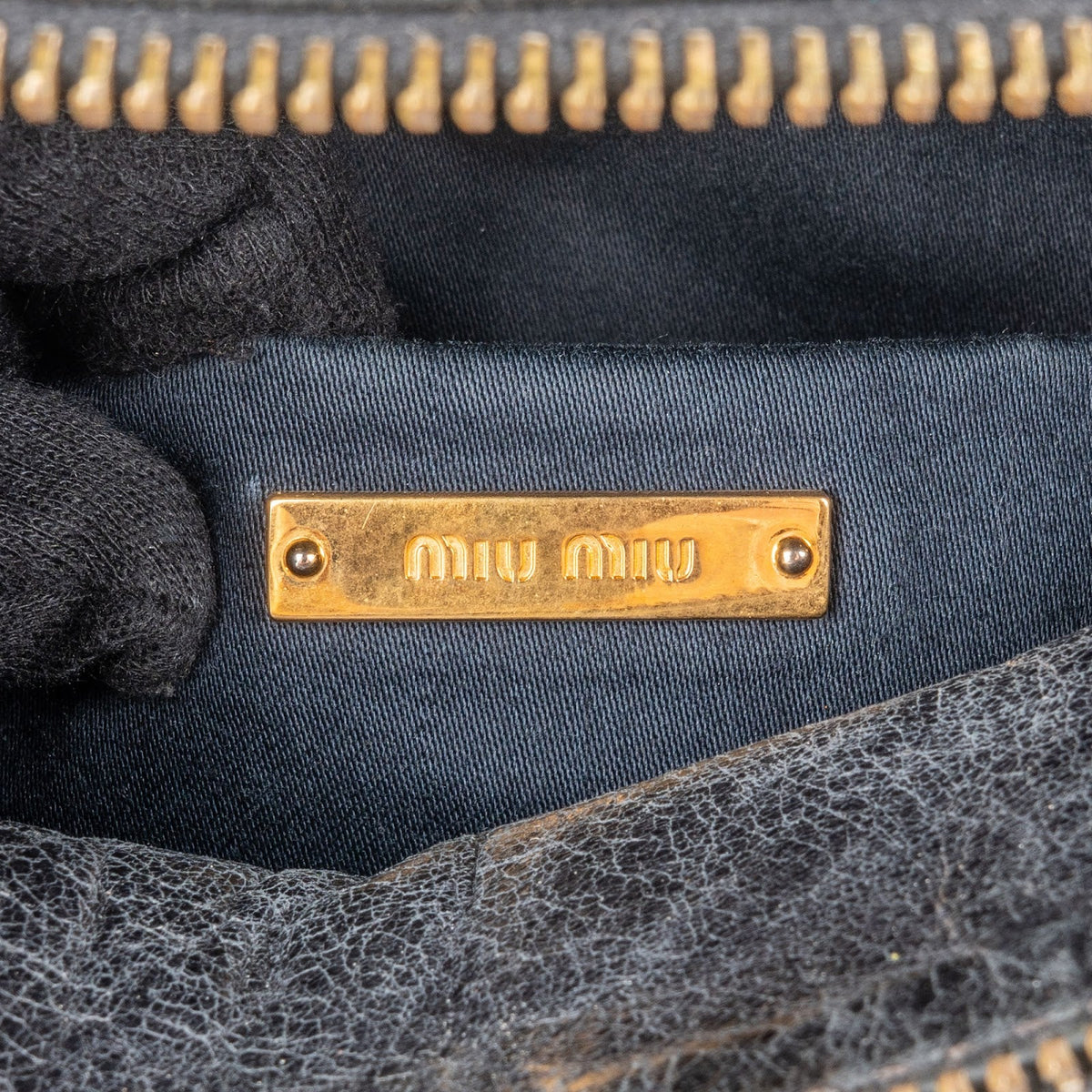 Bolso de mano pequeño con lazo Miu Miu de piel Vitello Lux