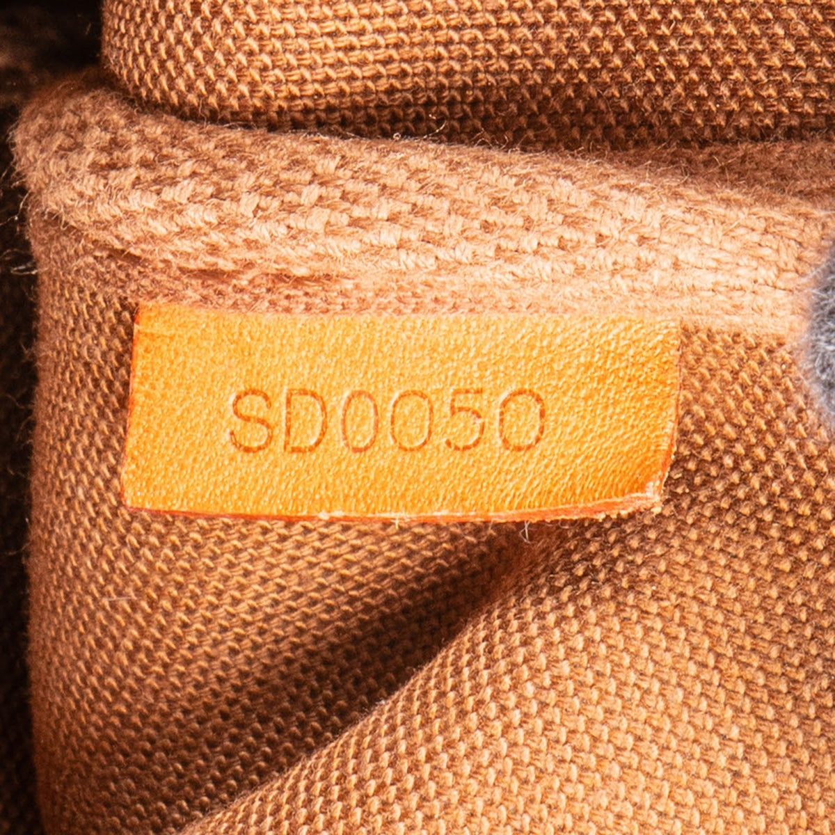 Bolso de mano Pochette Accessoires en lona Monogram de Louis Vuitton