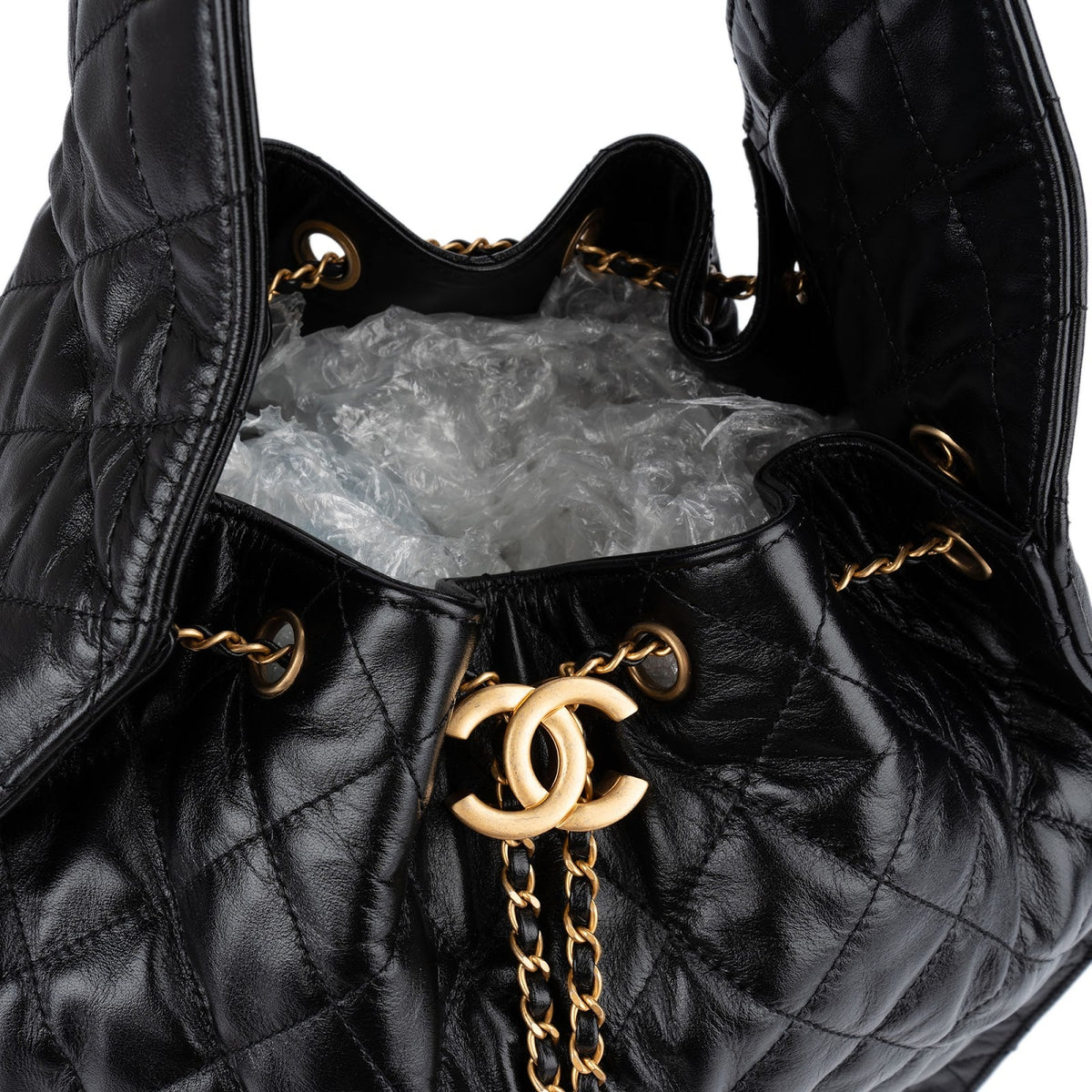 Chanel 25 Medium gewatteerde lamsleren bucket-schoudertas met trekkoord