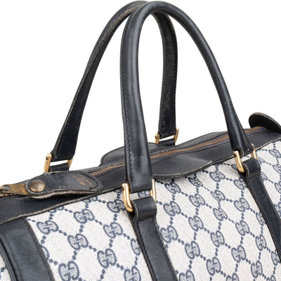 Sac à main Gucci Boston en toile GG Plus enduite bleu marine