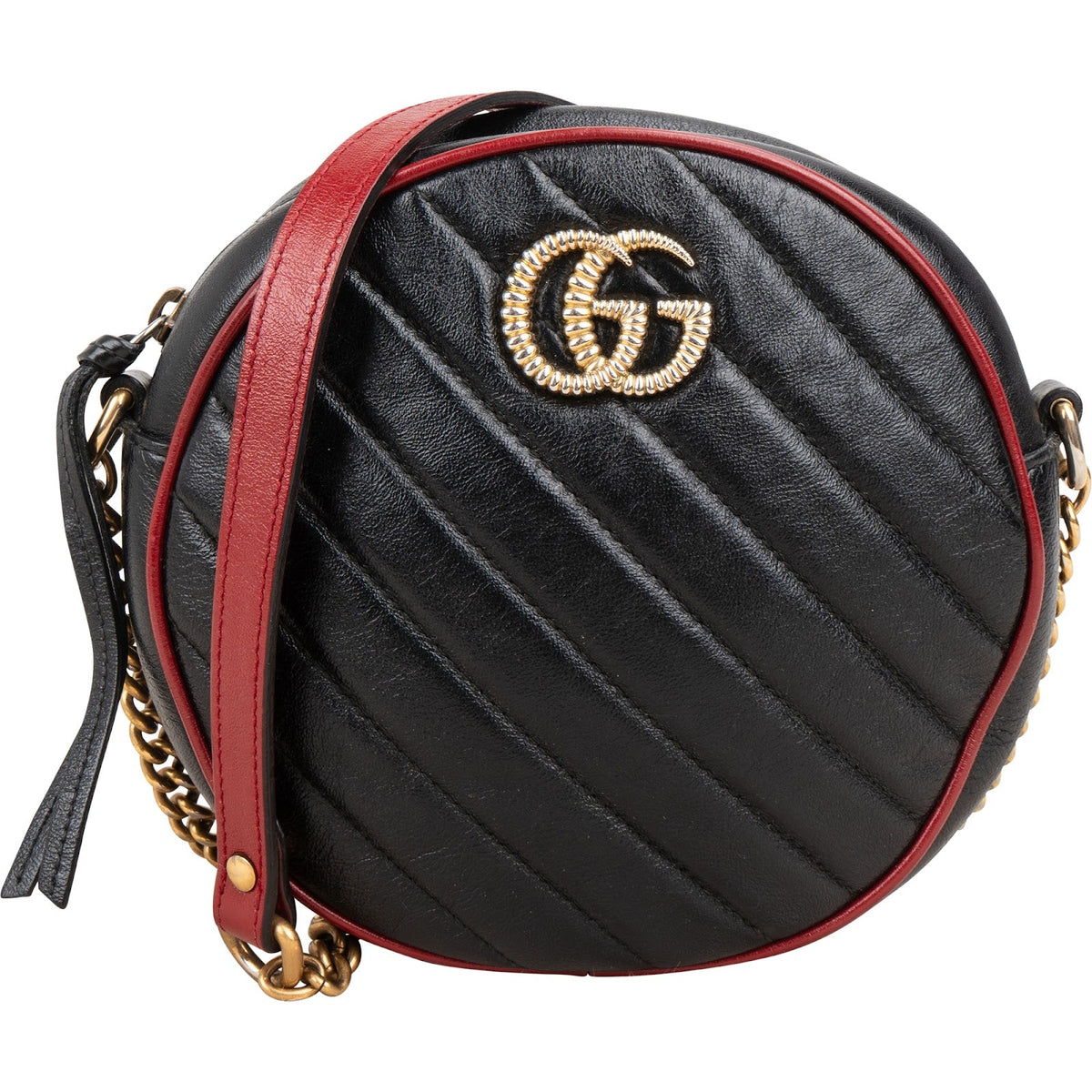 Bolso bandolera redondo GG Marmont de Gucci en piel acolchada bicolor