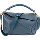 Loewe Blau Puzzle aus Leder und Stoff – Vorderansicht