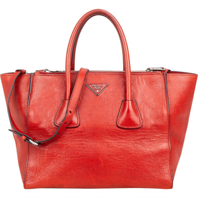 Bolso tote shopper de Prada en piel granulada glaseada con doble cremallera