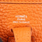 Bolso cruzado Evelyne 16 de Hermès en piel Clemence color naranja