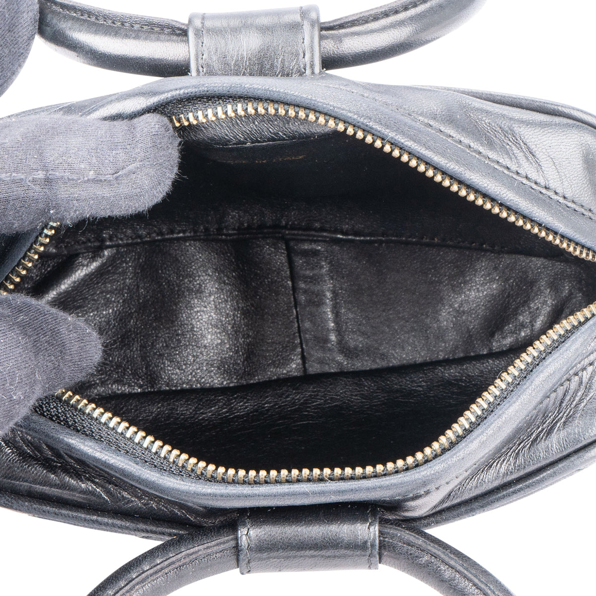 Bolso Chanel Iconic Camera Looping Circle de piel de cordero acolchada