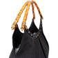 Bolso Gucci con monograma GG y detalle de bambú